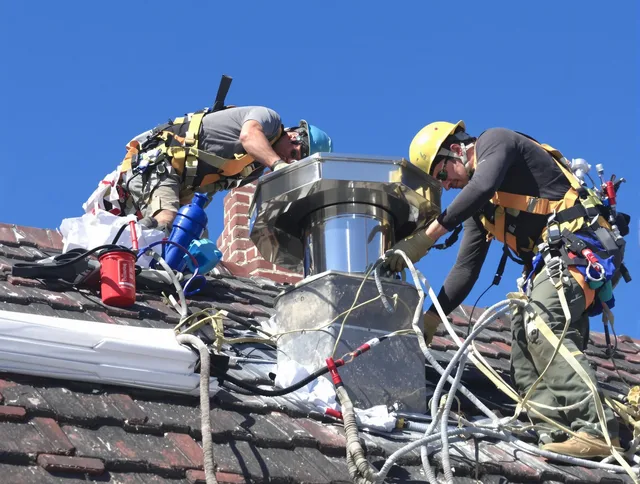 Protective chimney cap installed by Willowick Chimney Sweep in Willowick, OH