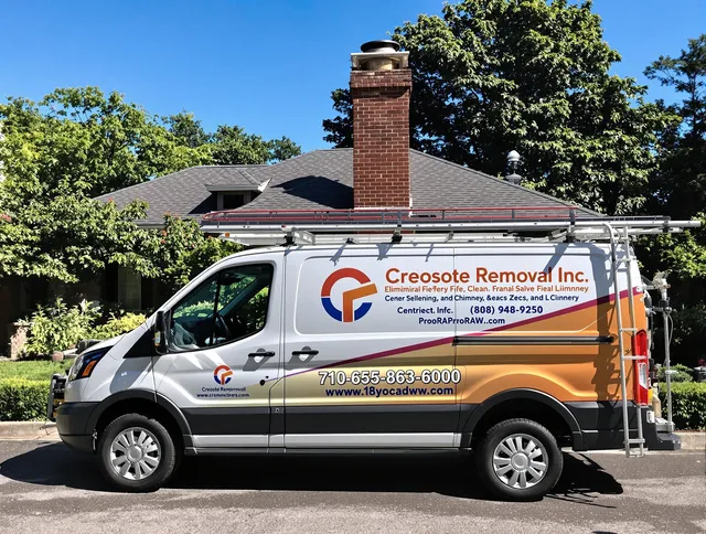 Willowick Chimney Sweep technician removing creosote safely in Willowick, OH